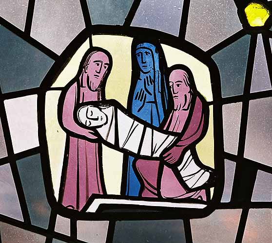 Jesus wird ins Grab gelegt.